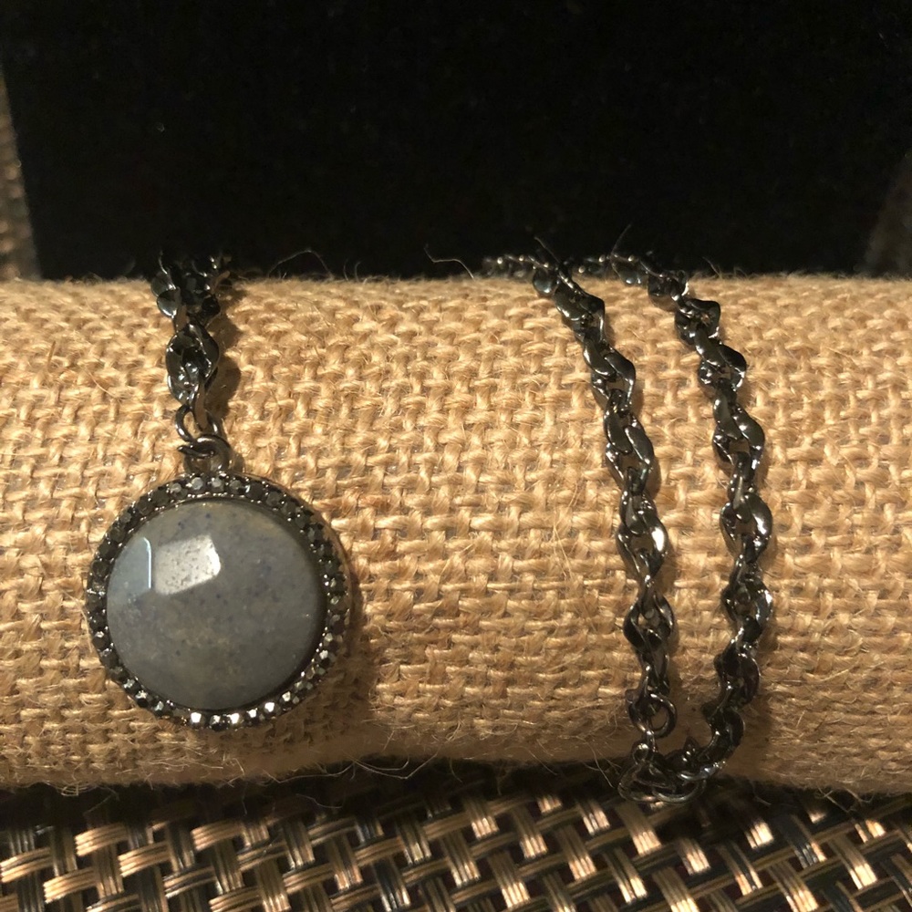 Woman’s pewter necklace and grey stone